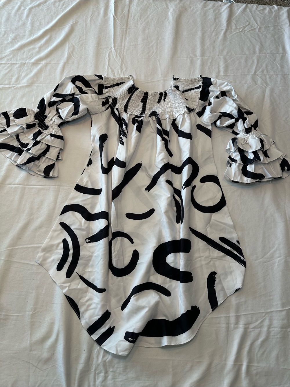 Abstract Black & White Off-Shoulder Smocked Tunic